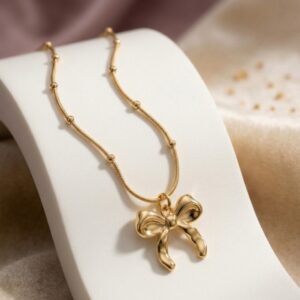 Gold Bow Pendant